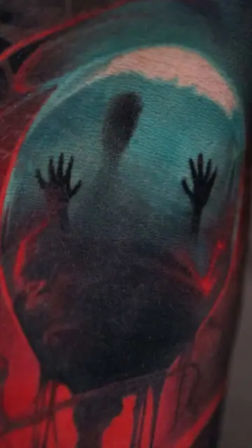 colour horror tattoo of trapped figure with hands on surface