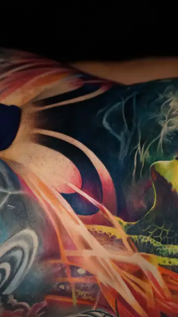 colour realism abstract cosmic tattoo on torso