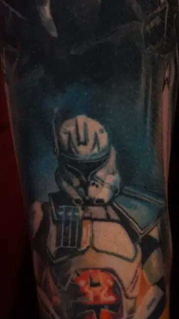 colour realism clone trooper tattoo on upper arm