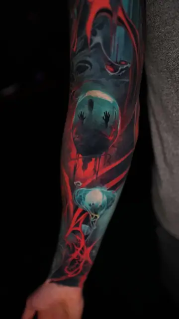 colour realism horror sleeve with figure in sphere and red abstract on arm