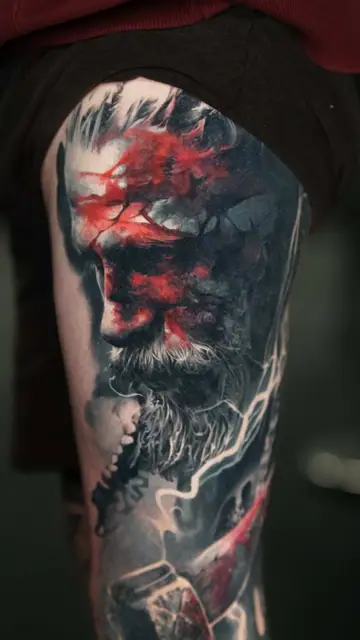 colour realism odin tattoo with lightning and mjolnir on upper leg