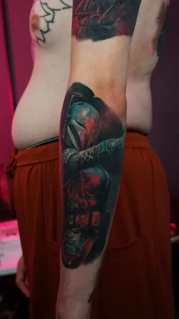 colour realism star wars mandalorian and vader tattoo on arm