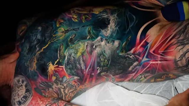colour realism surreal face, water, clock full back tattoo