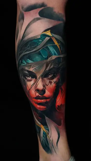 colour realism woman portrait tattoo on lower leg