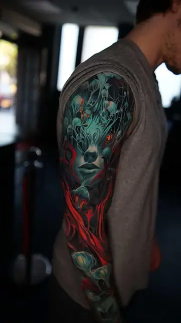 colour realism woman's face and mushrooms sleeve tattoo