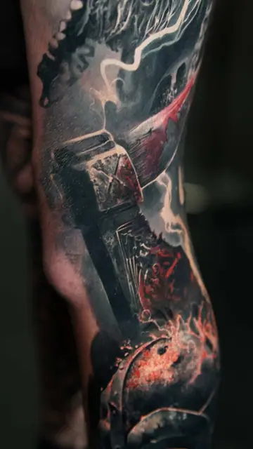 mighty thor's hammer black and grey with colour tattoo on leg
