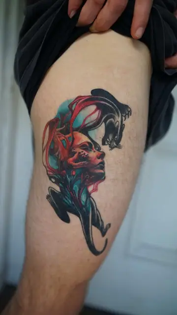 neo-traditional colourful woman and panther tattoo on upper thigh