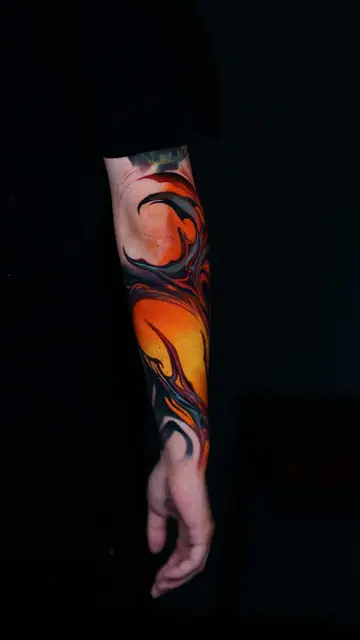 abstract colour tattoo on forearm and wrist