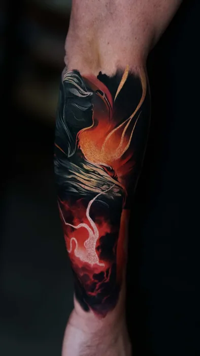 abstract colour realism fire and smoke wrap tattoo on forearm