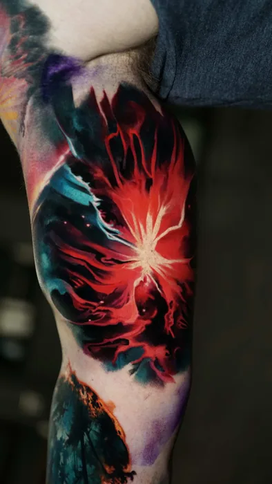 abstract colour realism red explosion and dark smoke tattoo on arm