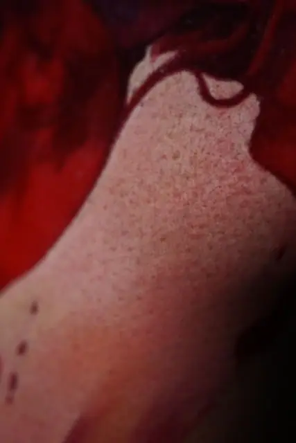abstract skin texture with red and purple ink on body part