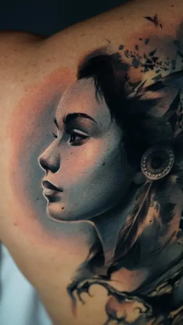 black and grey realism woman portrait tattoo on back shoulder