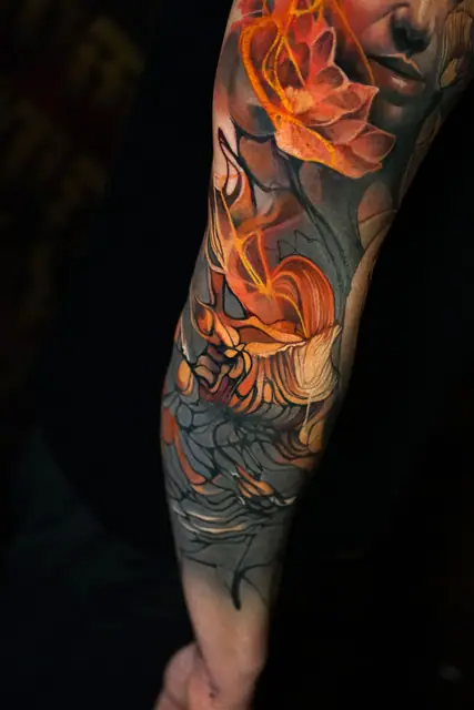 colour neo-traditional flowers and abstract lines full sleeve tattoo