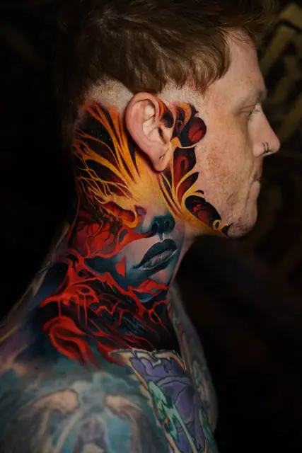 colour realism abstract face tattoo on side head and neck