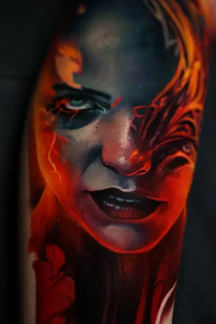 colour realism demonic woman portrait tattoo on arm
