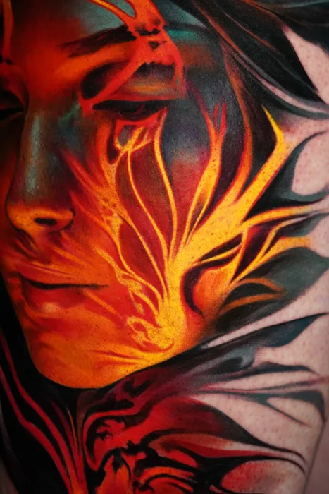 close-up of colour realism fiery woman's face tattoo