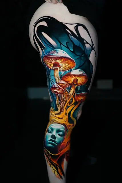 colour realism glowing mushrooms and serene face tattoo on leg