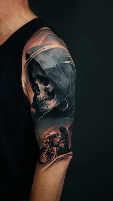 colour realism grim reaper and motorcycle tattoo on upper arm