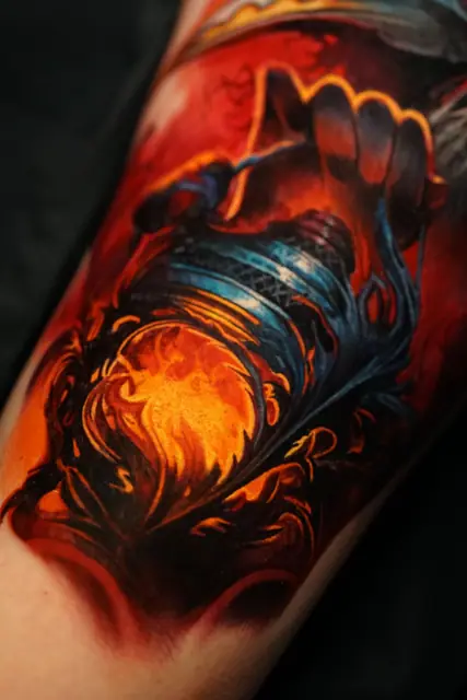colour realism hand holding burning lantern tattoo on arm