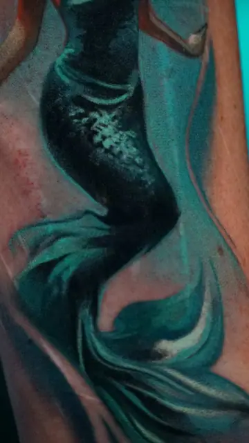 colour realism mermaid tail tattoo on hip