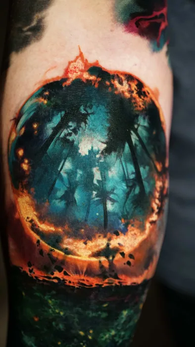 colour realism night forest ringed with fire tattoo on forearm
