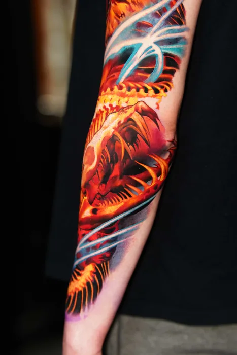 colour realism phoenix with white light trails full sleeve tattoo