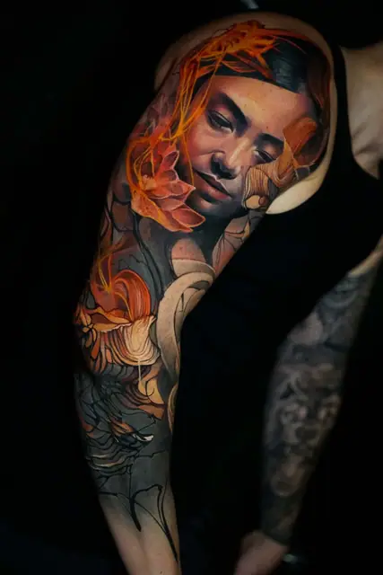 colour realism portrait and organic shapes full arm sleeve