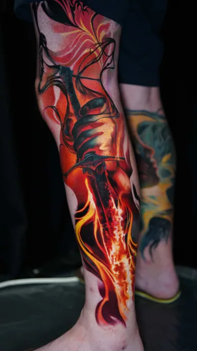 colour realism red and orange flame tattoo on lower leg