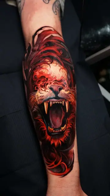 colour realism roaring lion tattoo on forearm