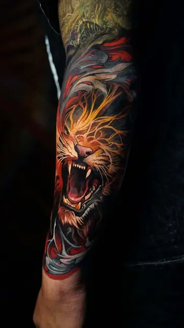colour realism roaring lion tattoo on full arm