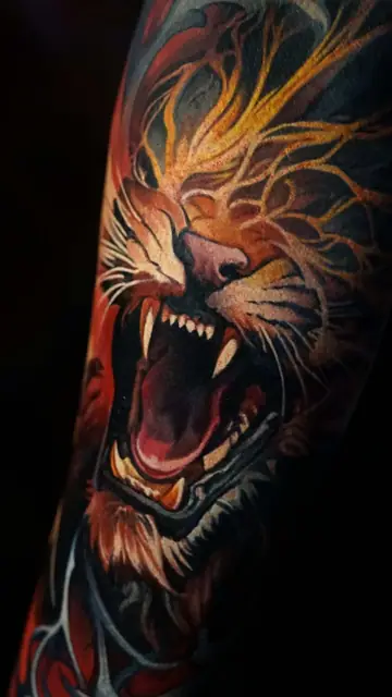 colour realism roaring tiger tattoo on arm