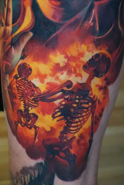 colour realism skeletons in fire with woman's face on leg
