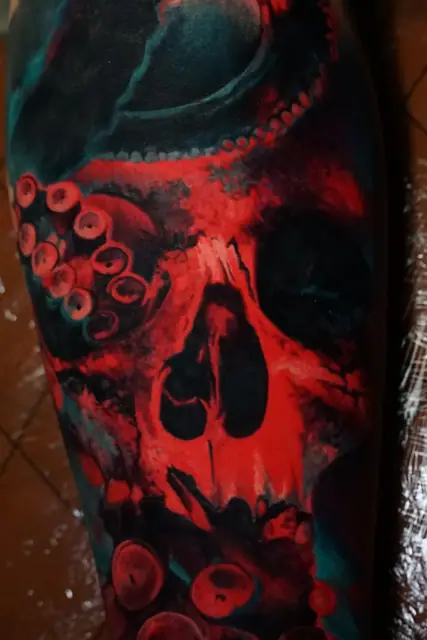 colour realism skull and octopus tattoo on arm