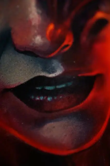 colour realism smiling face with blue teeth and red shadow