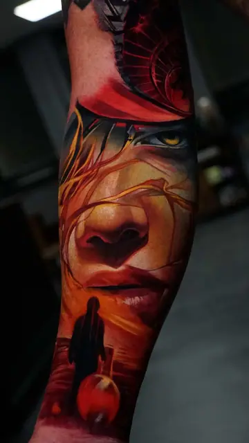 colour realism surreal face and figure with red orb tattoo on forearm