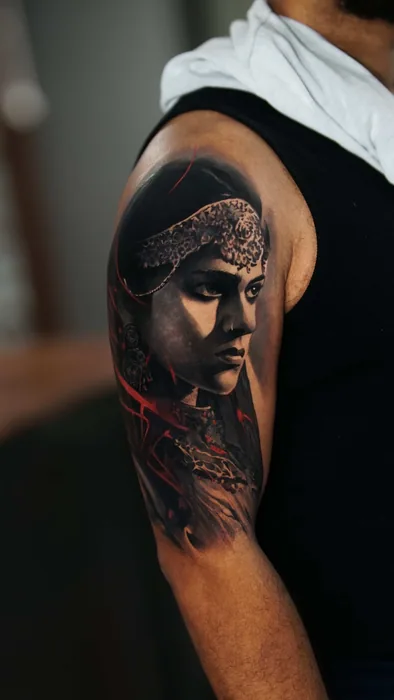 colour realism warrior portrait with red smoke tattoo on upper arm