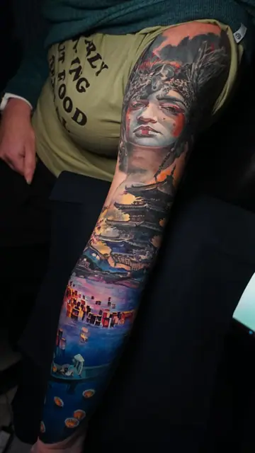 colour realism woman and floating lanterns full sleeve tattoo