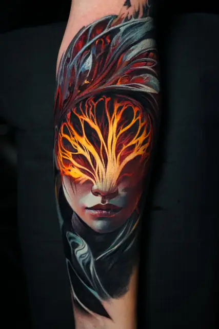 colour realism cover up of a woman with glowing tree eyes on inner forearm