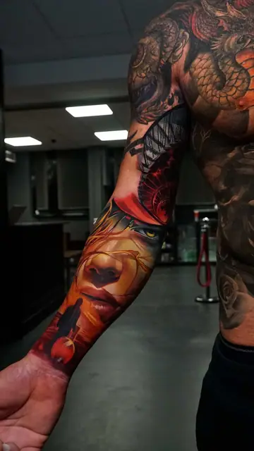 colour realism woman's face and figure tattoo on forearm sleeve