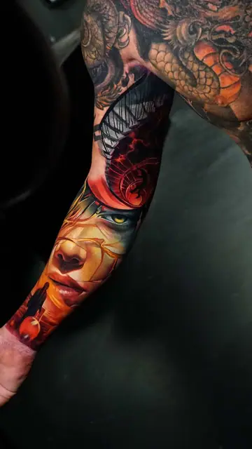 colour realism woman's face tattoo sleeve