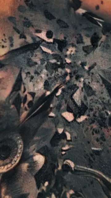 dark abstract black and grey tattoo on skin