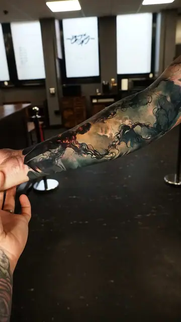 stormy sky colour realism tattoo on forearm sleeve