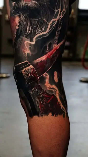 thor/stormbreaker colour realism tattoo on leg